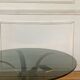 Round smoked glass coffee table from the 70s