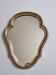 Antique carved mirror in patinated gilded wood with original glass, 40x32 cm.