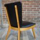 Cocktail armchair of the 50s in wood and black imitation