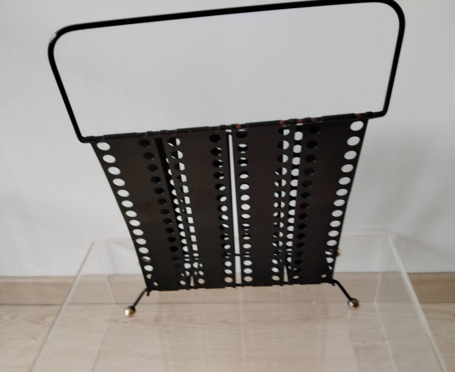 “Santiago” magazine rack in perforated sheet metal Mathieu Mategot 1950s