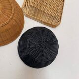 Wall composition of wicker baskets and trays.