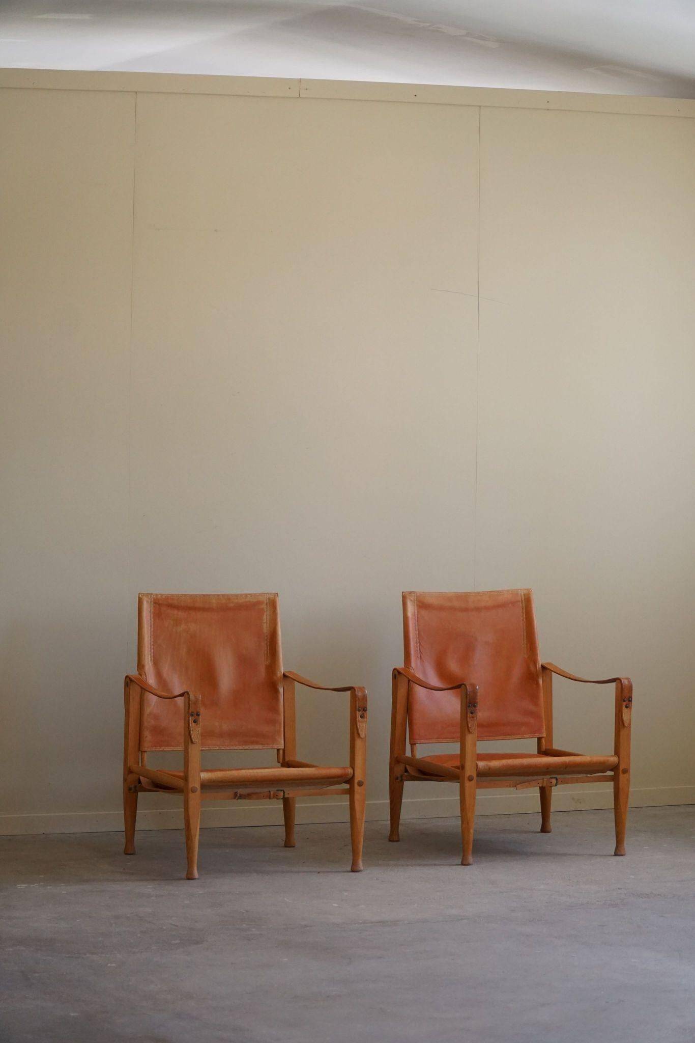 Kaare Klint, a pair of Safari chairs in ash and leather, Rud. Rasmussen, 1960s.