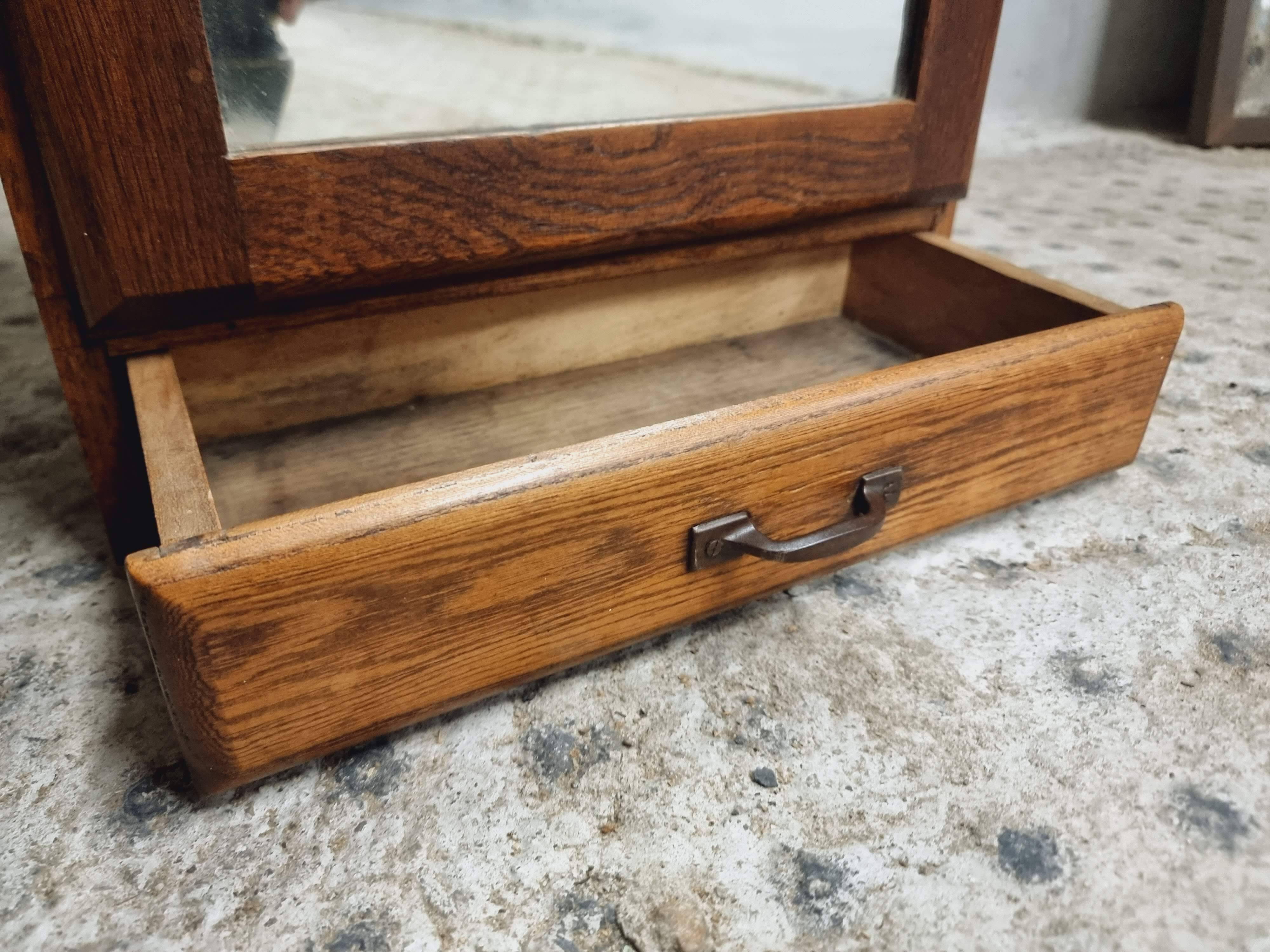 Old hanging cupboard medicine cabinet with mirror and drawer