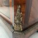 Napoleon III display cabinet in rosewood veneer and marquetry, 19th century.