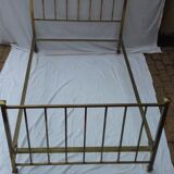 Golden metal bed