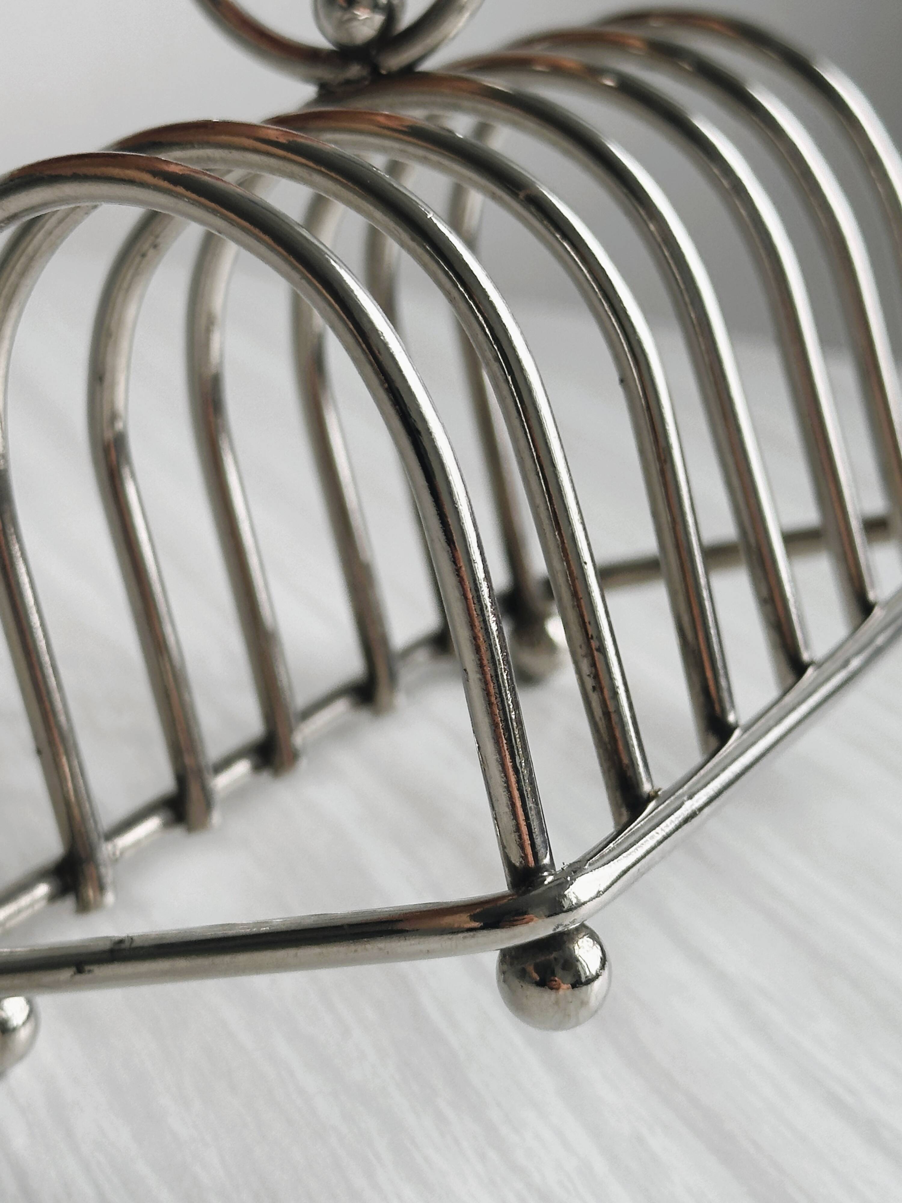 Stainless steel toast rack.