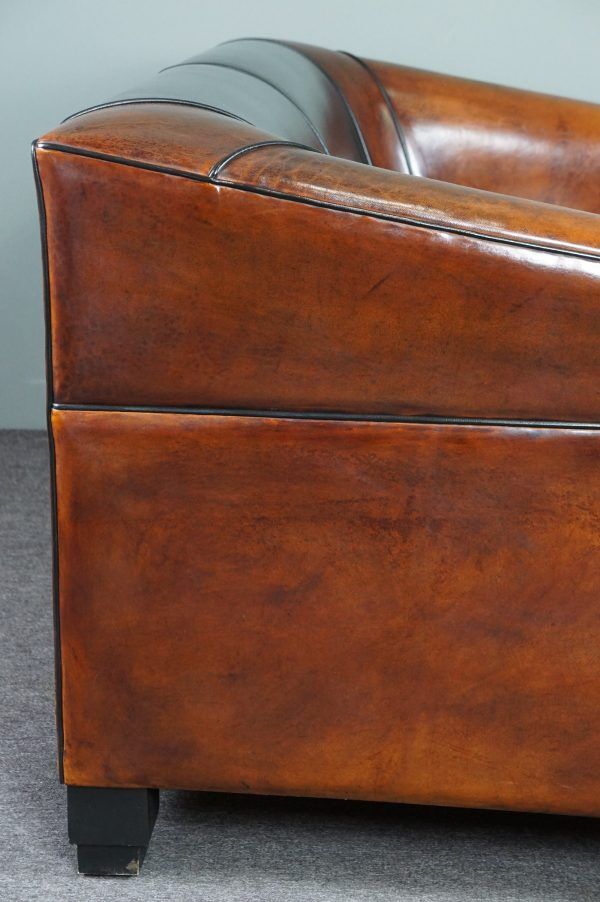 2.5-seater art deco style sofa in sheepskin