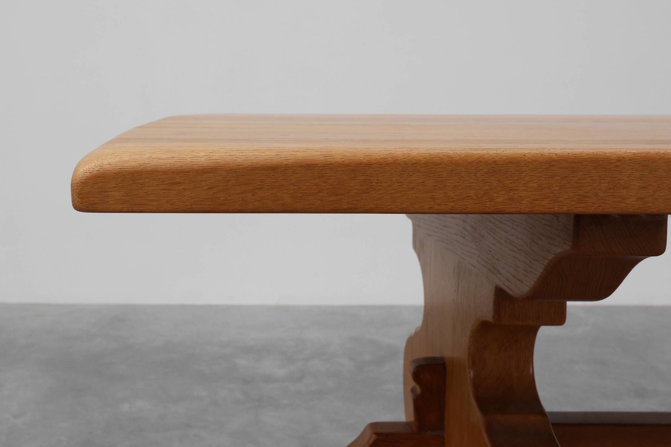 20th Century French oak trestle table with scalloped legs and plank top
