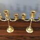 Paire de chandeliers en laiton