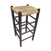 Blackened wooden bar top stool with mulched seat