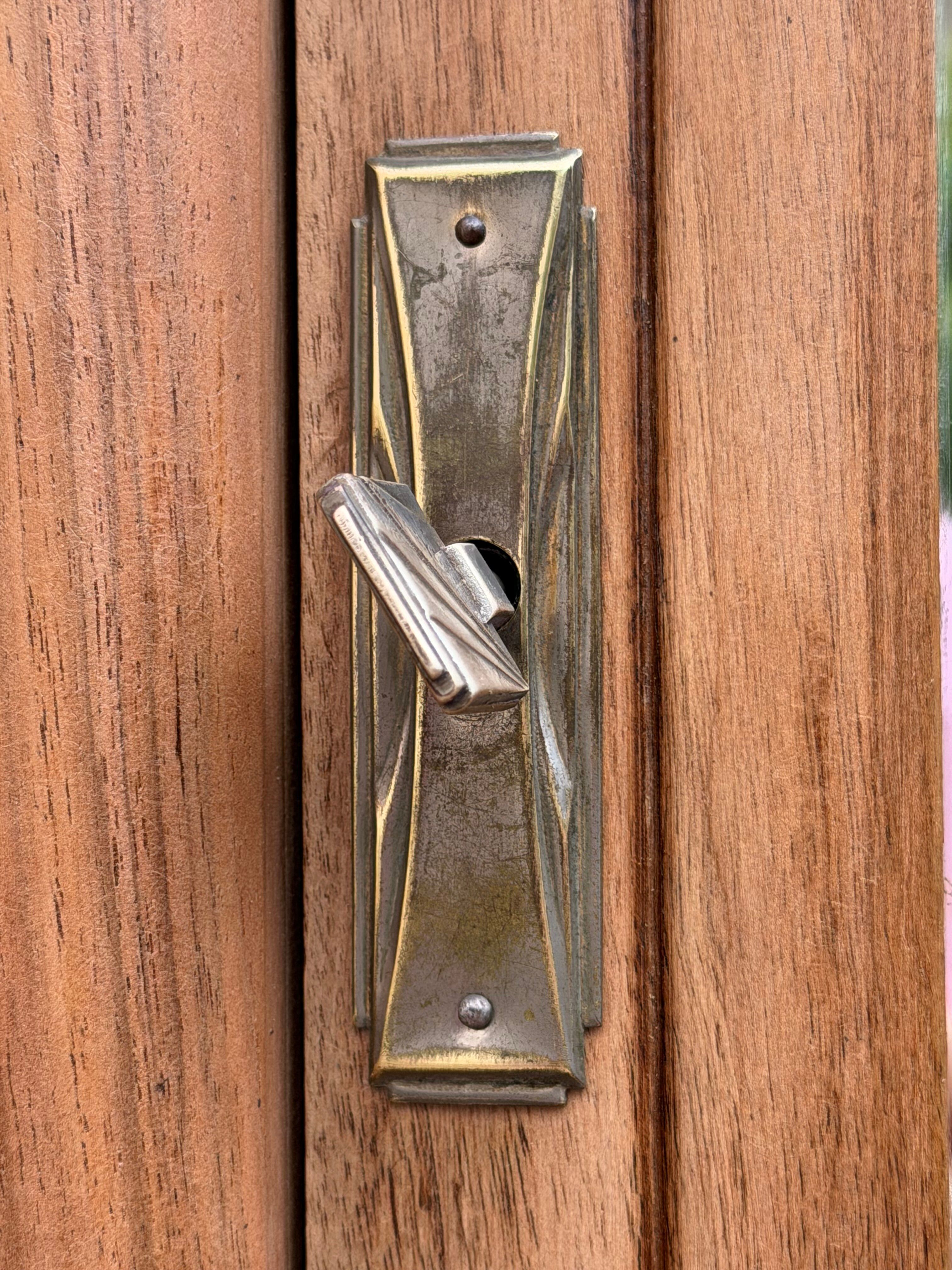 Art Deco wardrobe with bevelled mirror in solid raw walnut.
