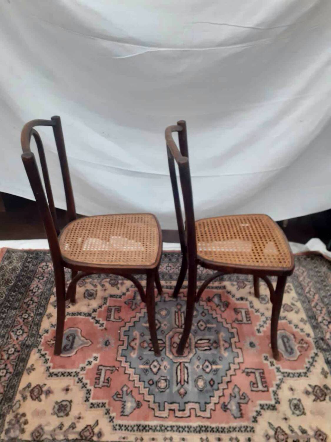 2 vintage caned bistro chairs