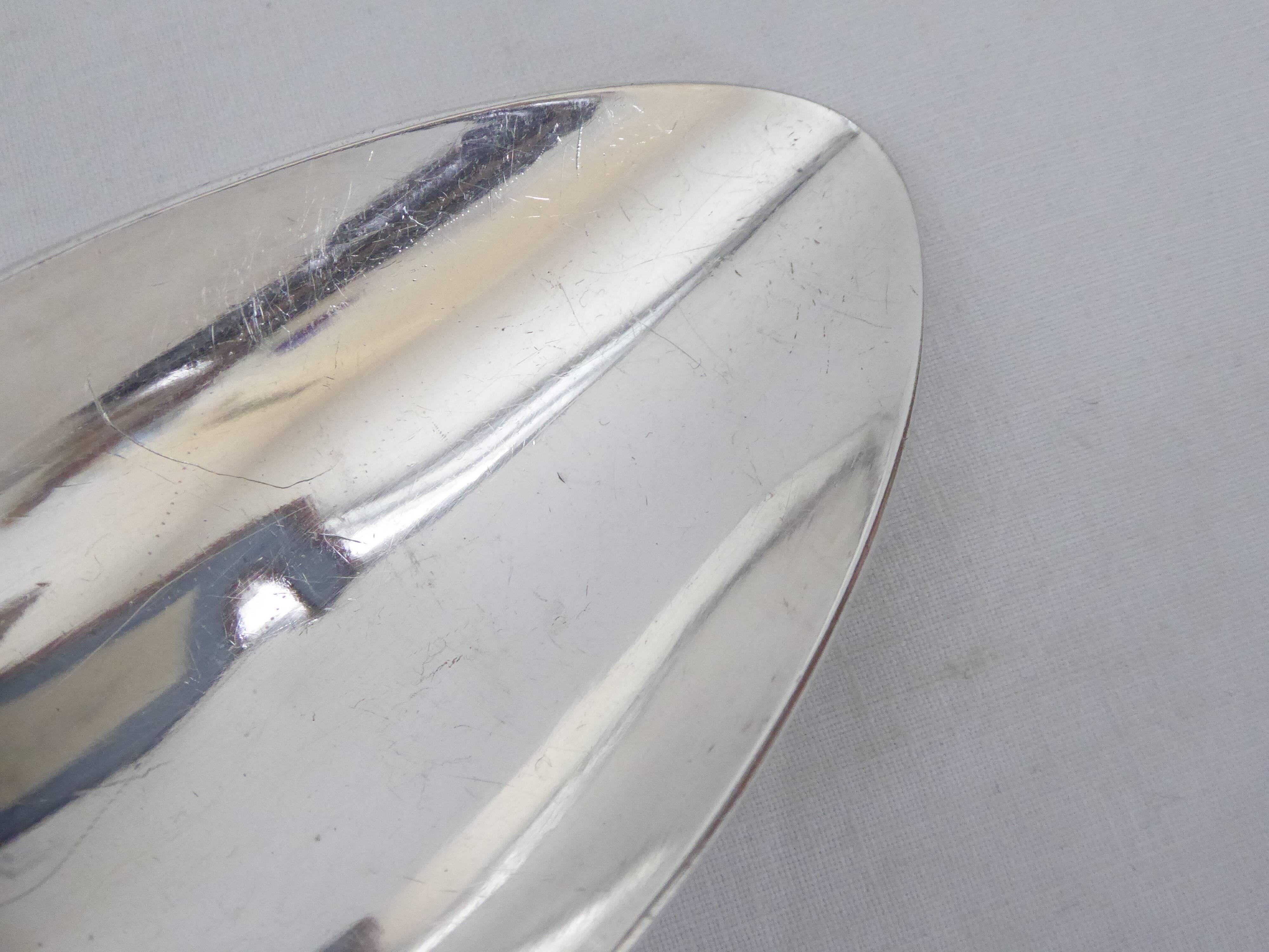 Silver metal serving spoon