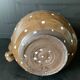 Brown enamelled ceramic pitcher with polka dots