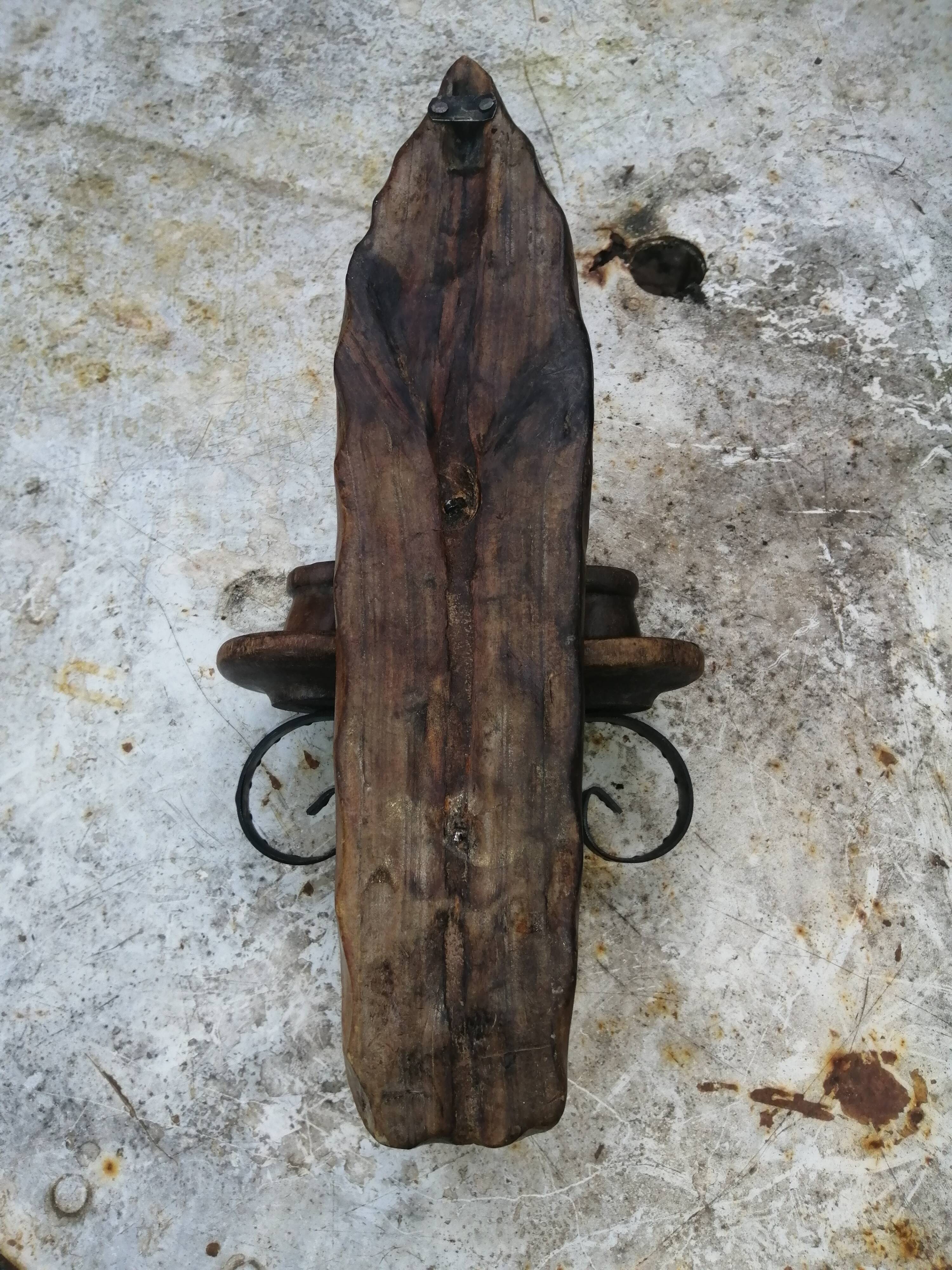 Rustic wooden wall lamp.