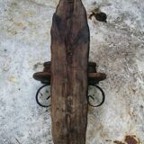Rustic wooden wall lamp.