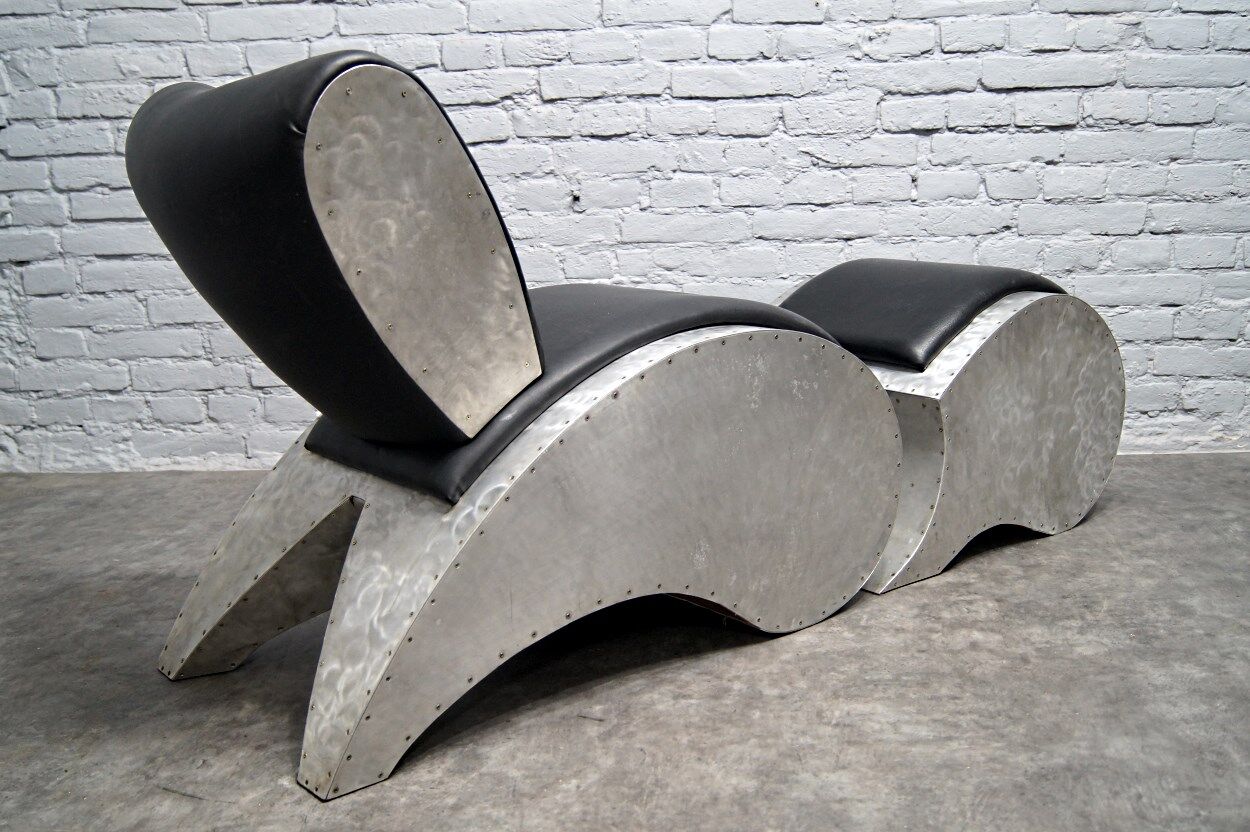 Industrial aluminum & vinyl lounge chair with footrest, 1970s