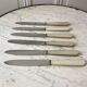 set of 6 white bakelite knives from the 60s