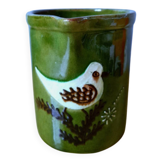 Ceramic bird pitcher.