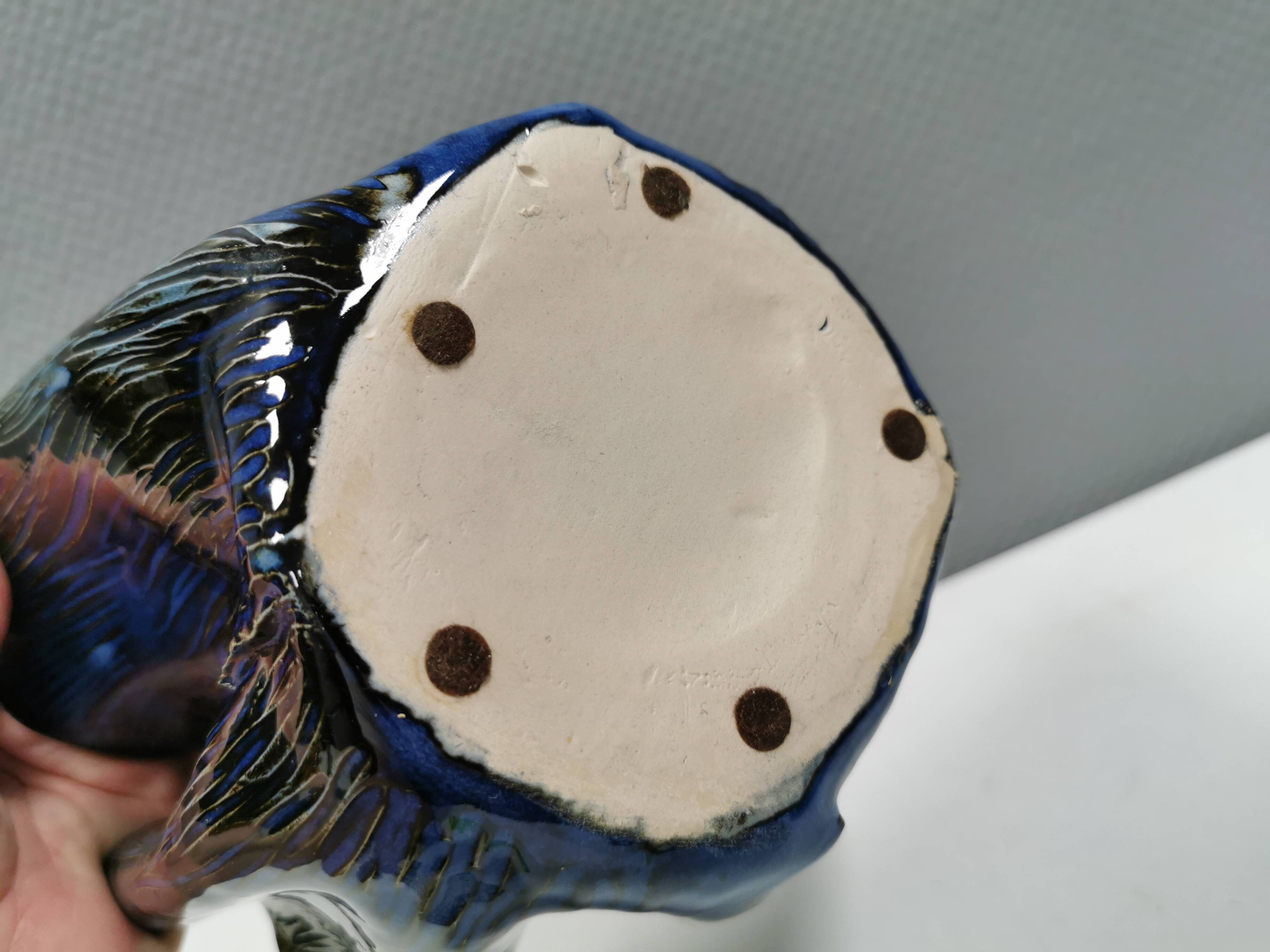 Very special vase in “folded” bluish glazed clay.