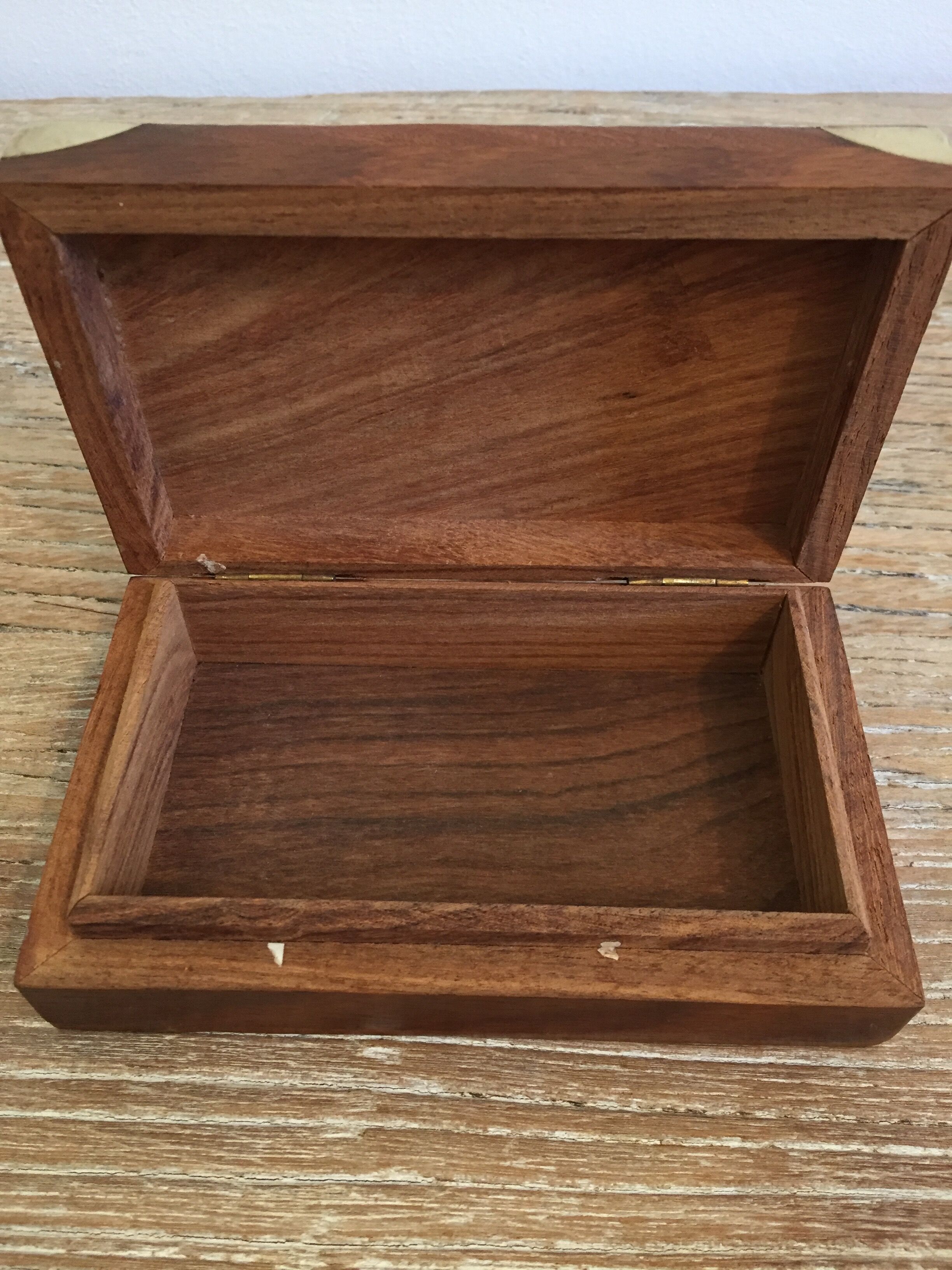 Small cabinet in walnut and brass