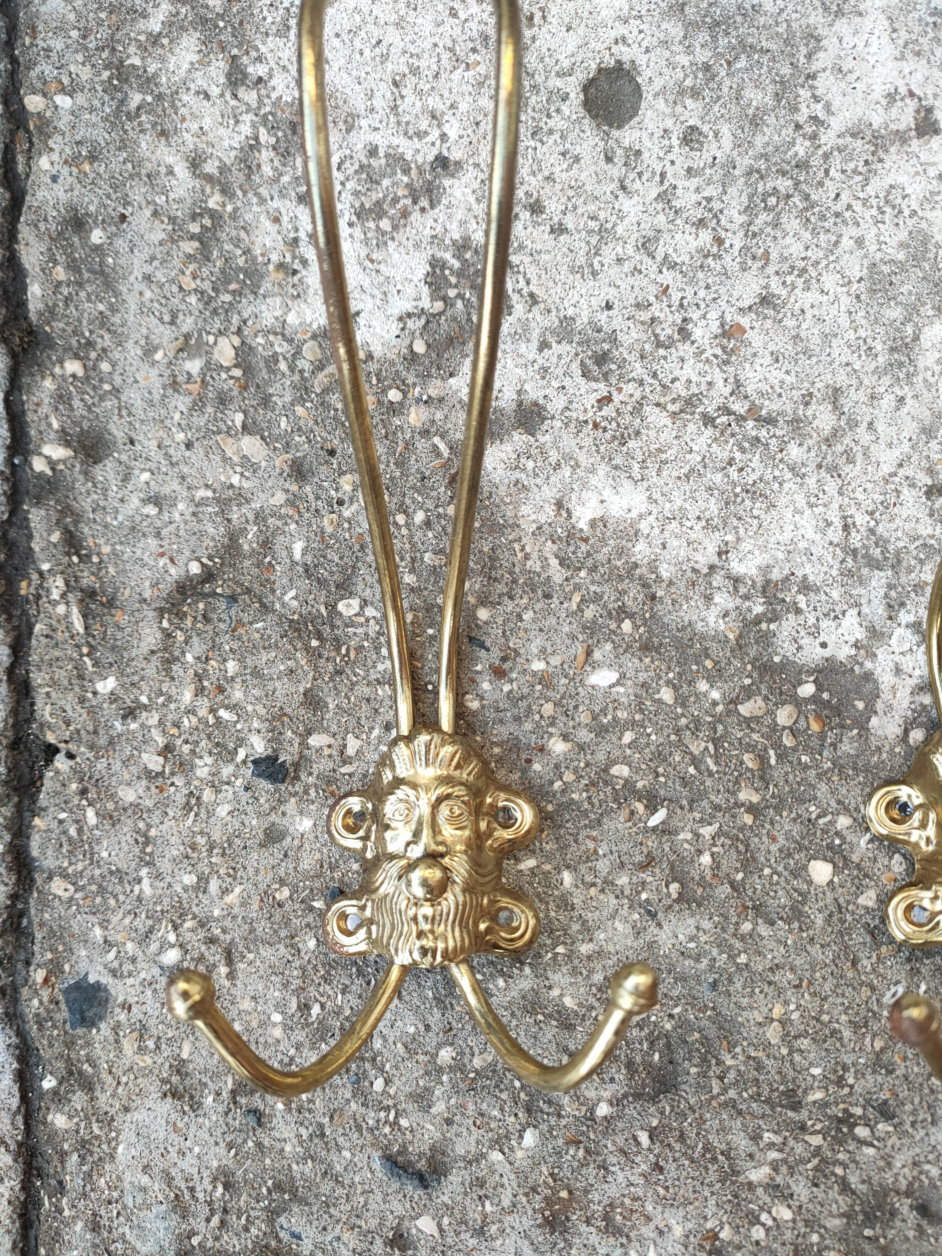 set of 5 antique gold metal hooks