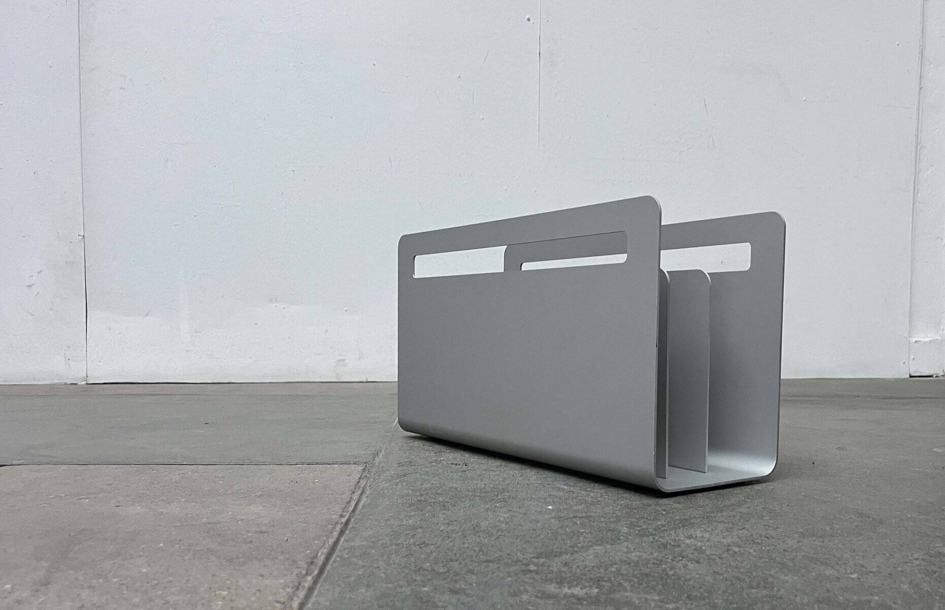 Minimalist aluminium magazine rack by Norman Foster for Helit, Germany, 1990s.