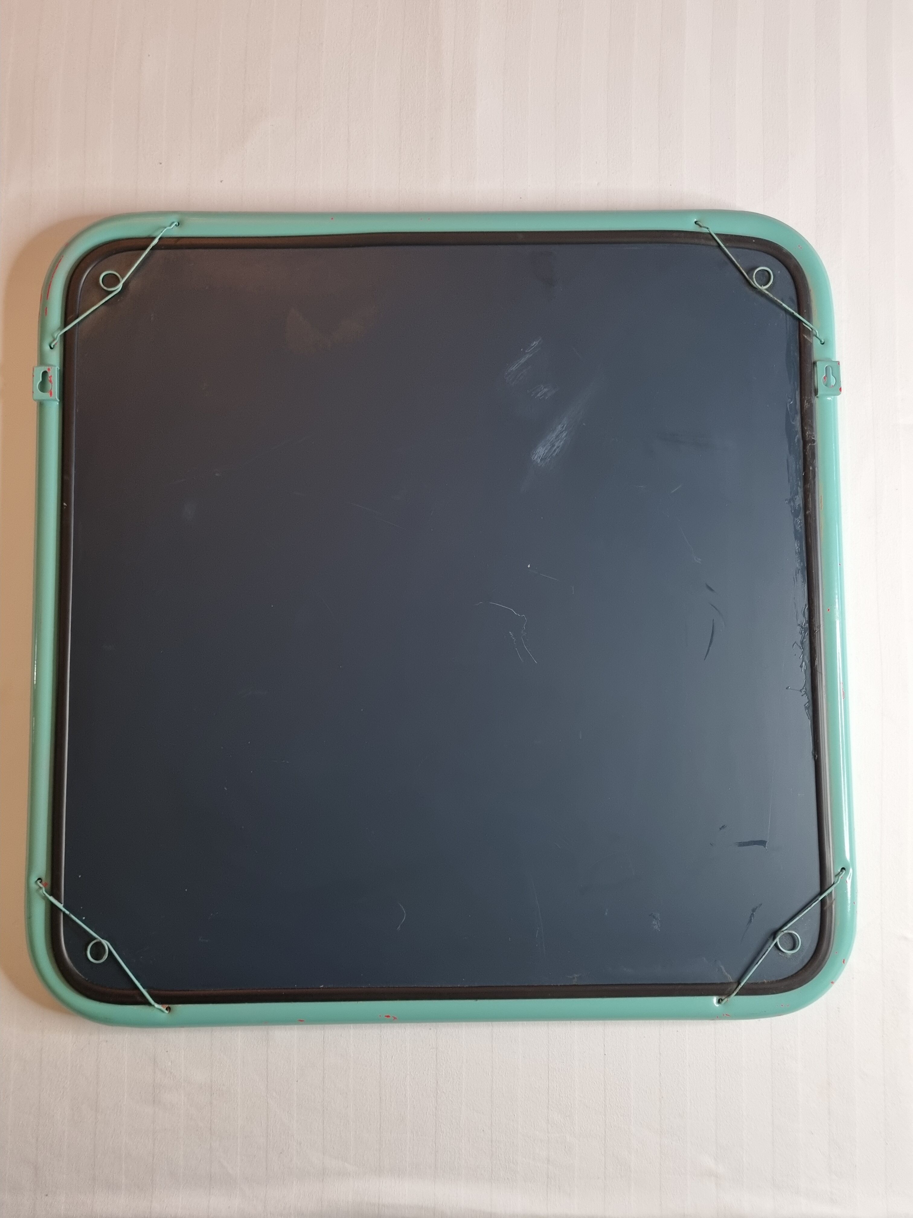 Vintage mirror in painted tubular steel of rectangular shape, 60 cm