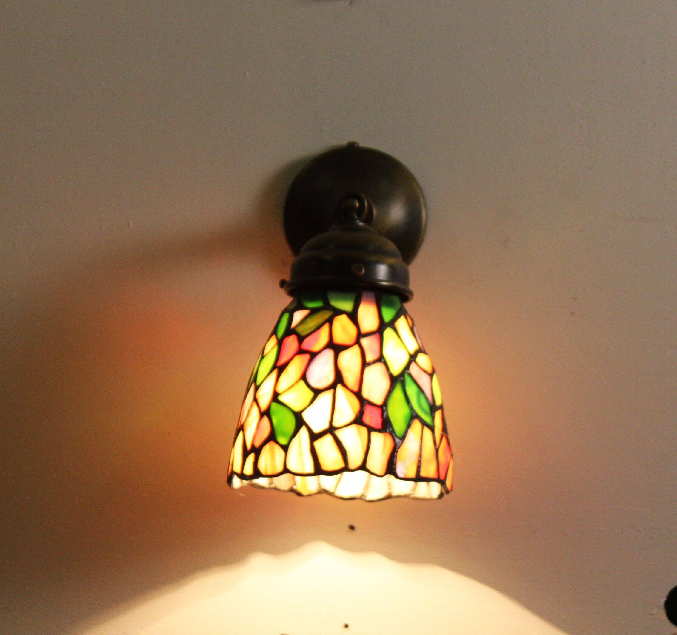 Tiffany lamp, stained glass and tin.