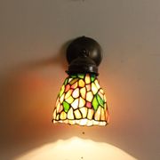 Tiffany lamp, stained glass and tin.