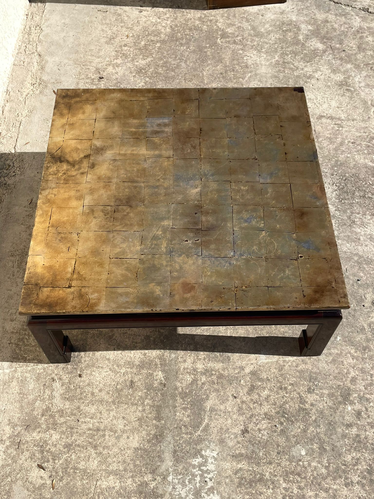 Coffee table covered with gold leaf