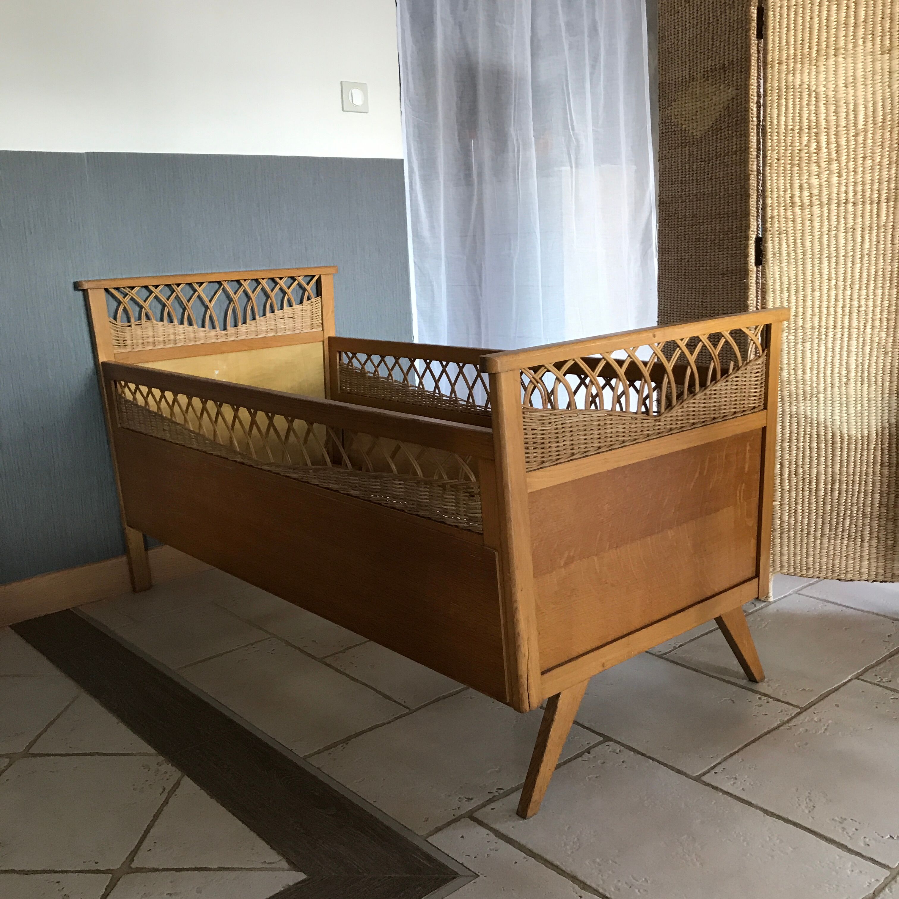 Vintage wood and rattan year 60 baby bed