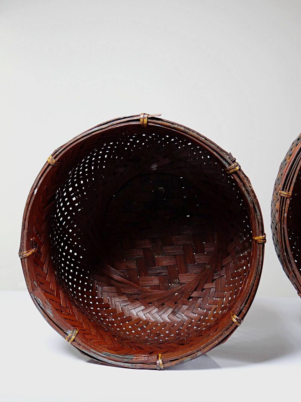 Pair of vintage nesting handmade Japanese woven bamboo baskets