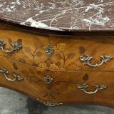 Curved and inlaid Louis XV style chest of drawers