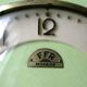 Pendulum wall clock FFR in formica green of the 1960s