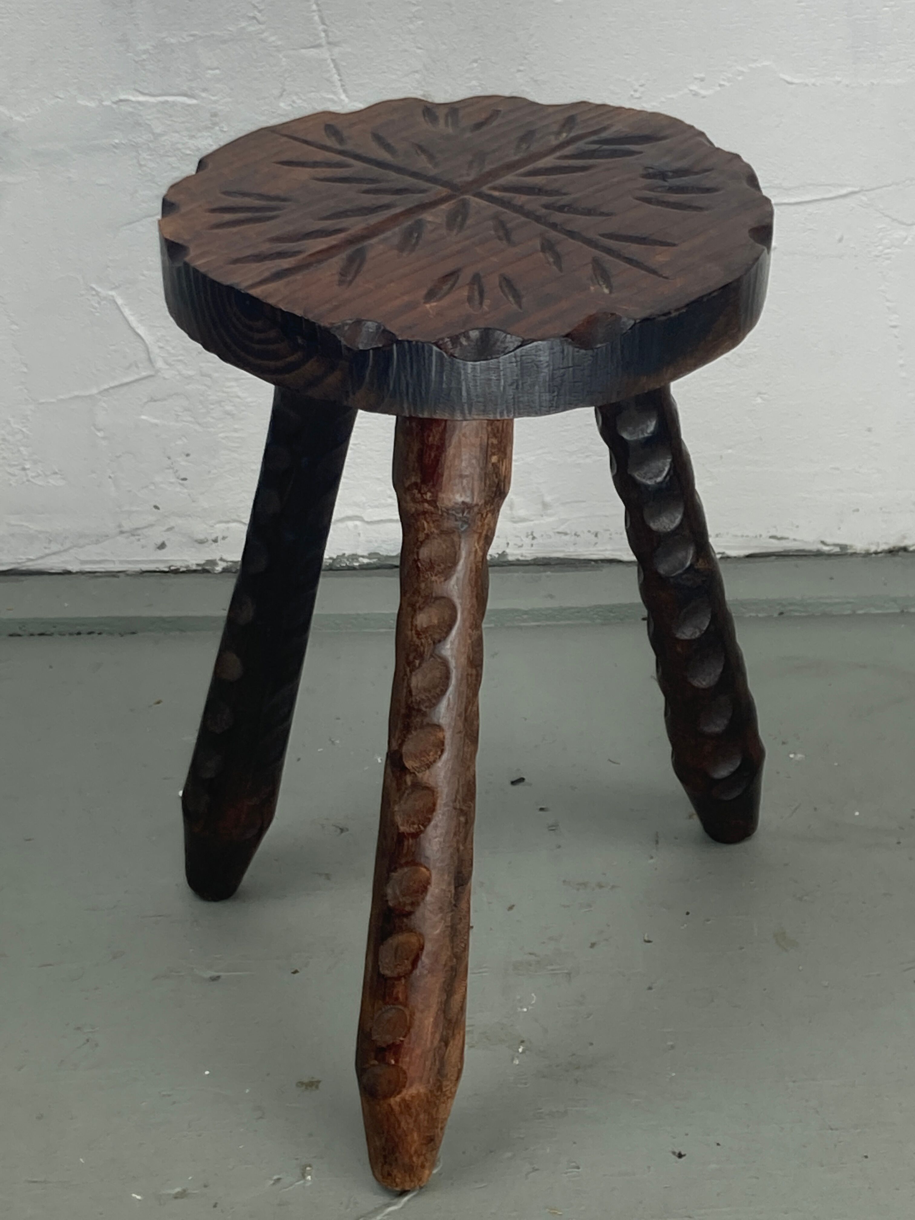 Brutalist carved tripod milking stool, 1950s