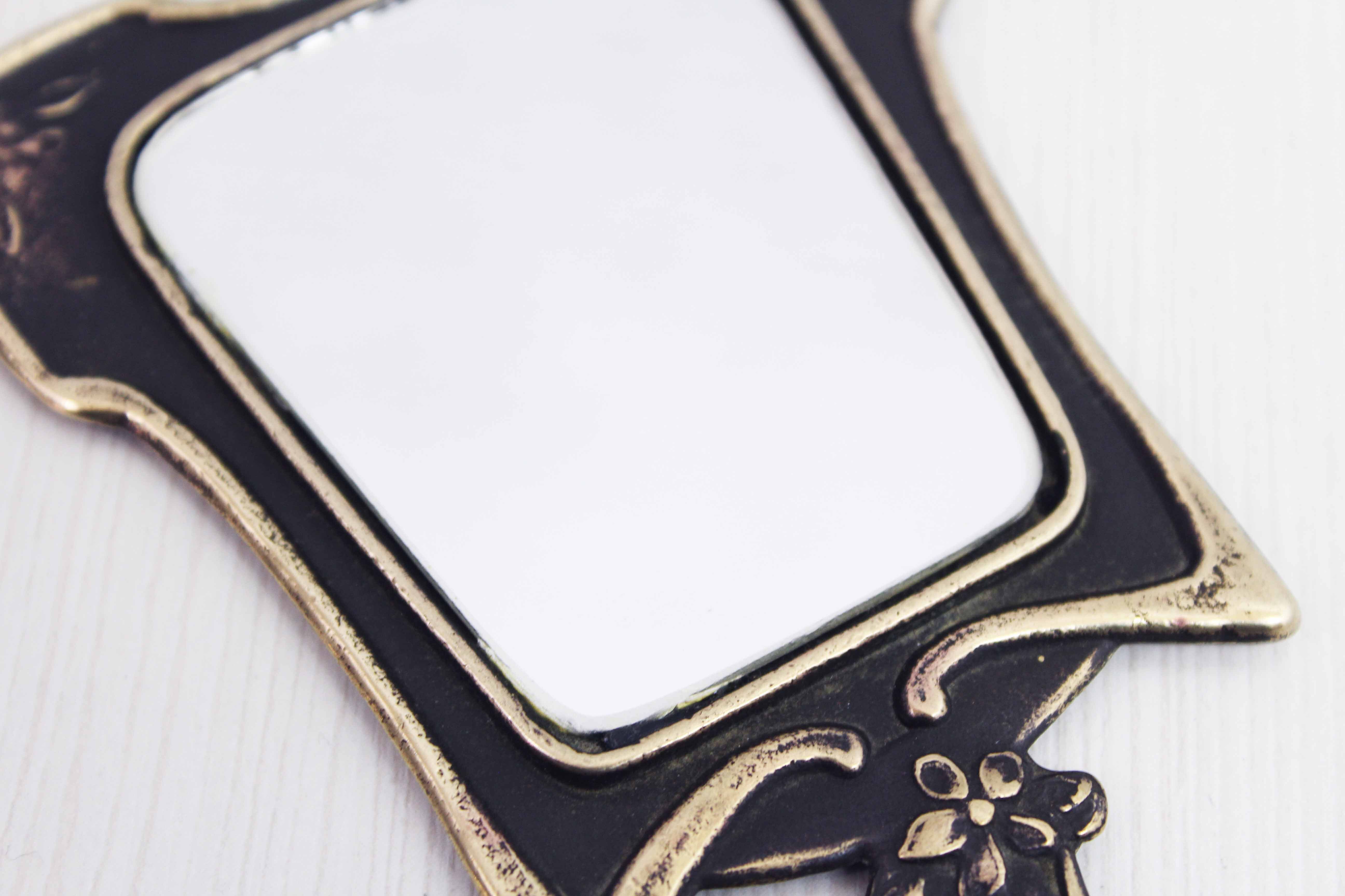 Art Deco hand mirror in bronze 8x17cm