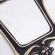 Art Deco hand mirror in bronze 8x17cm
