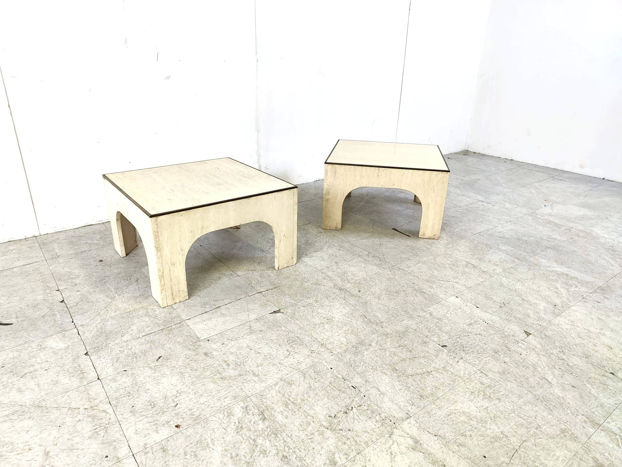 Pair of travertine and brass coffee tables, 1970s