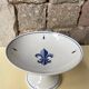 Fleur-de-lis earthenware fruit bowl signed Henriot