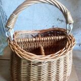 Covered rattan basket for lunch on 50s grass