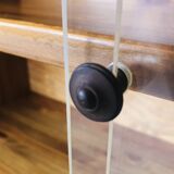Vintage wall shelf with plexiglass sliding doors