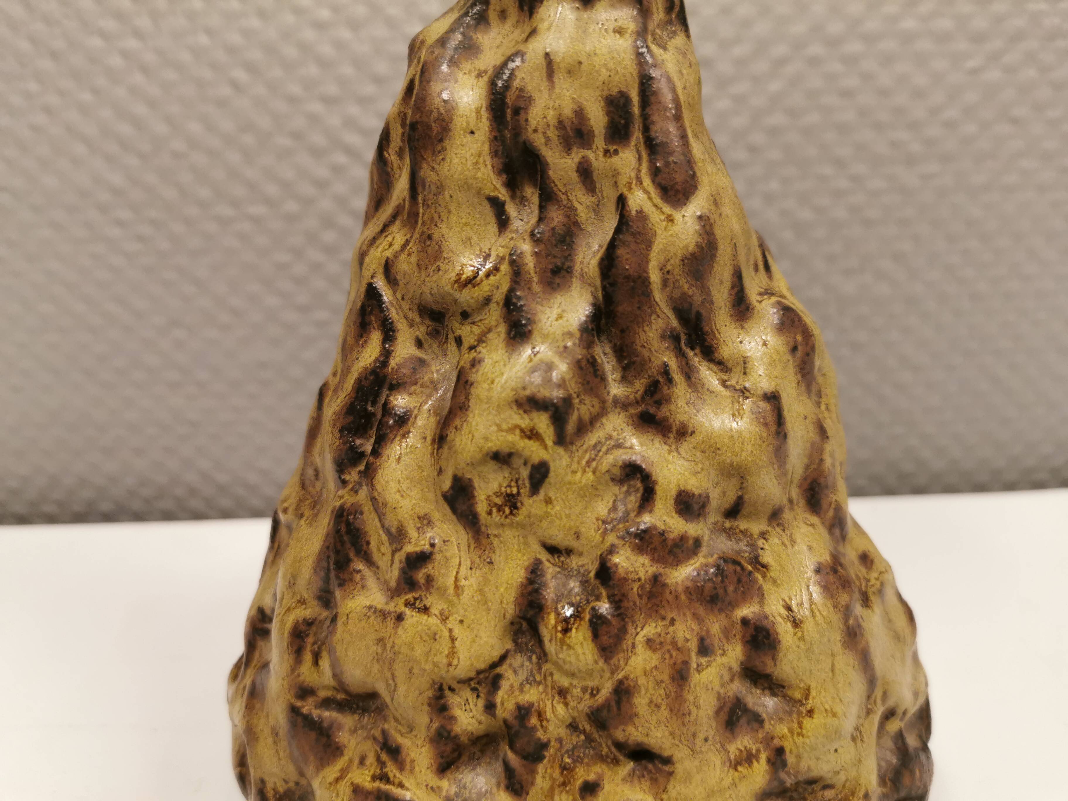Ceramic table lamp, in greenish/brownish glaze, almost in the shape of a volcano.