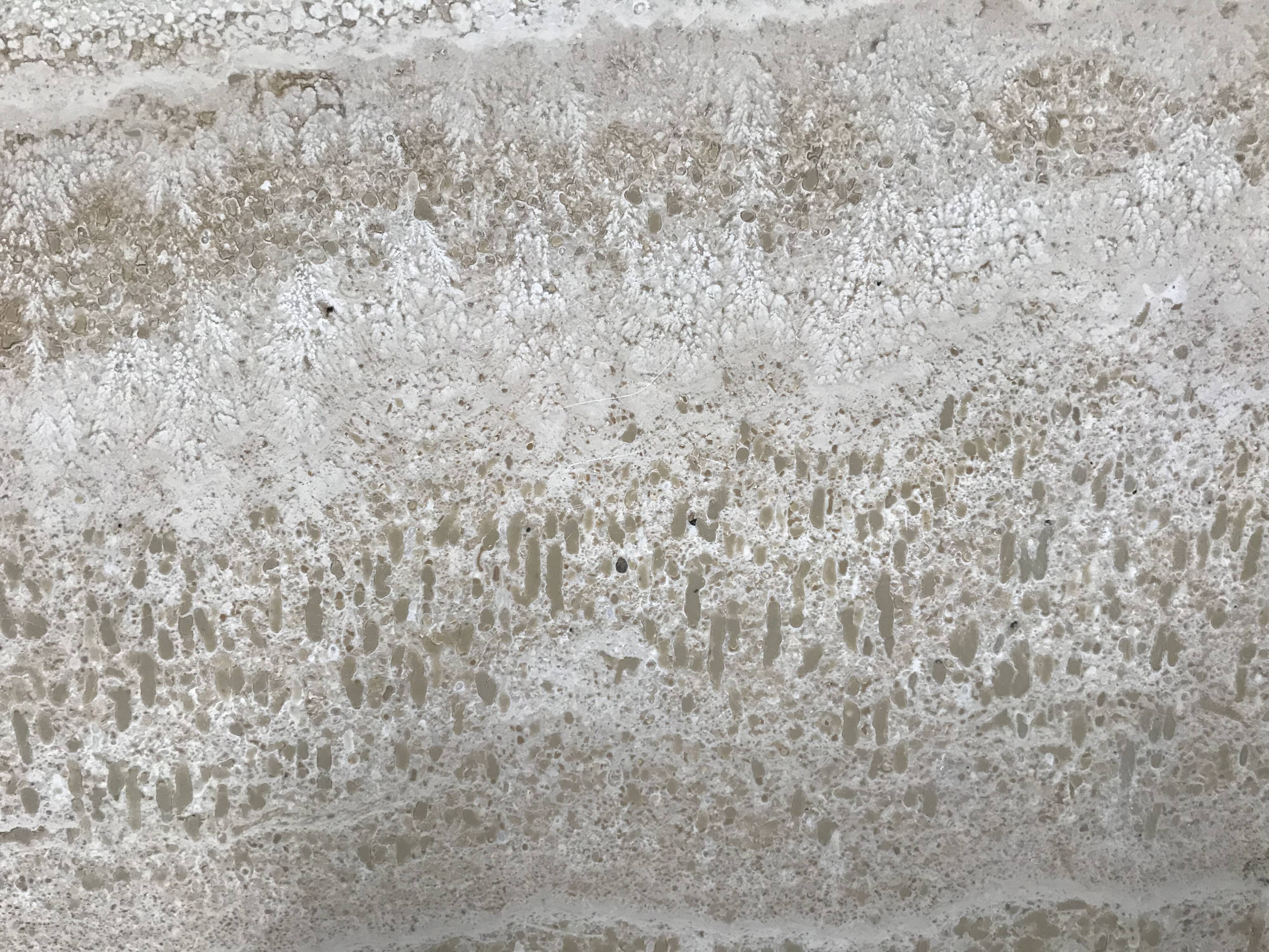 Vintage travertine coffee table by Georges Mathias