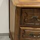 Commode de style Louis XV en bois naturel