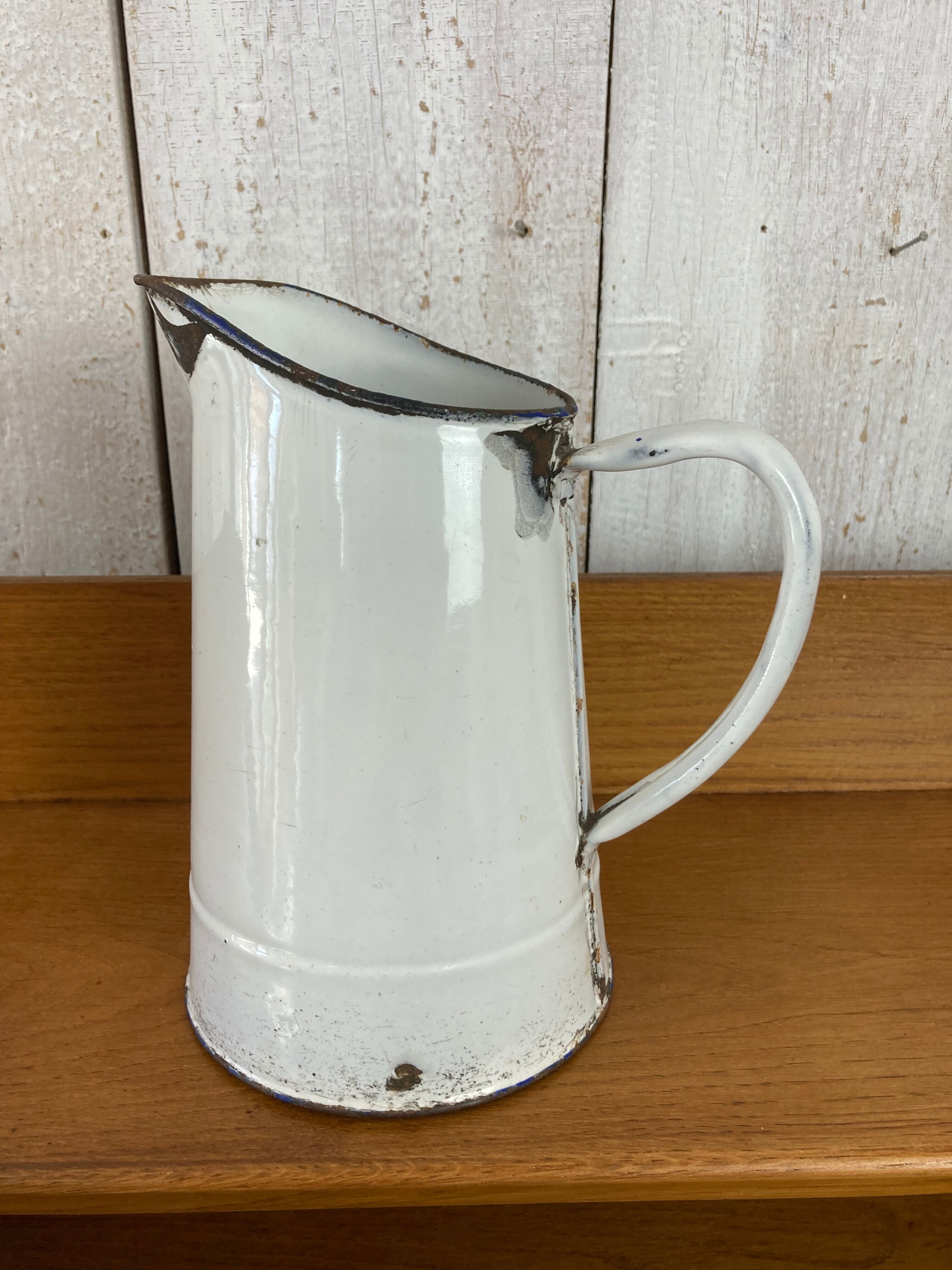 Enamelled pitcher