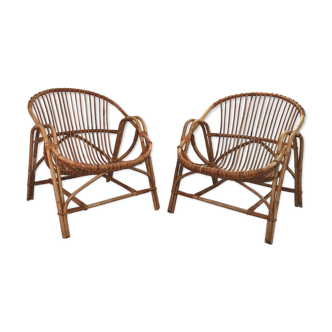Two rattan armchairs