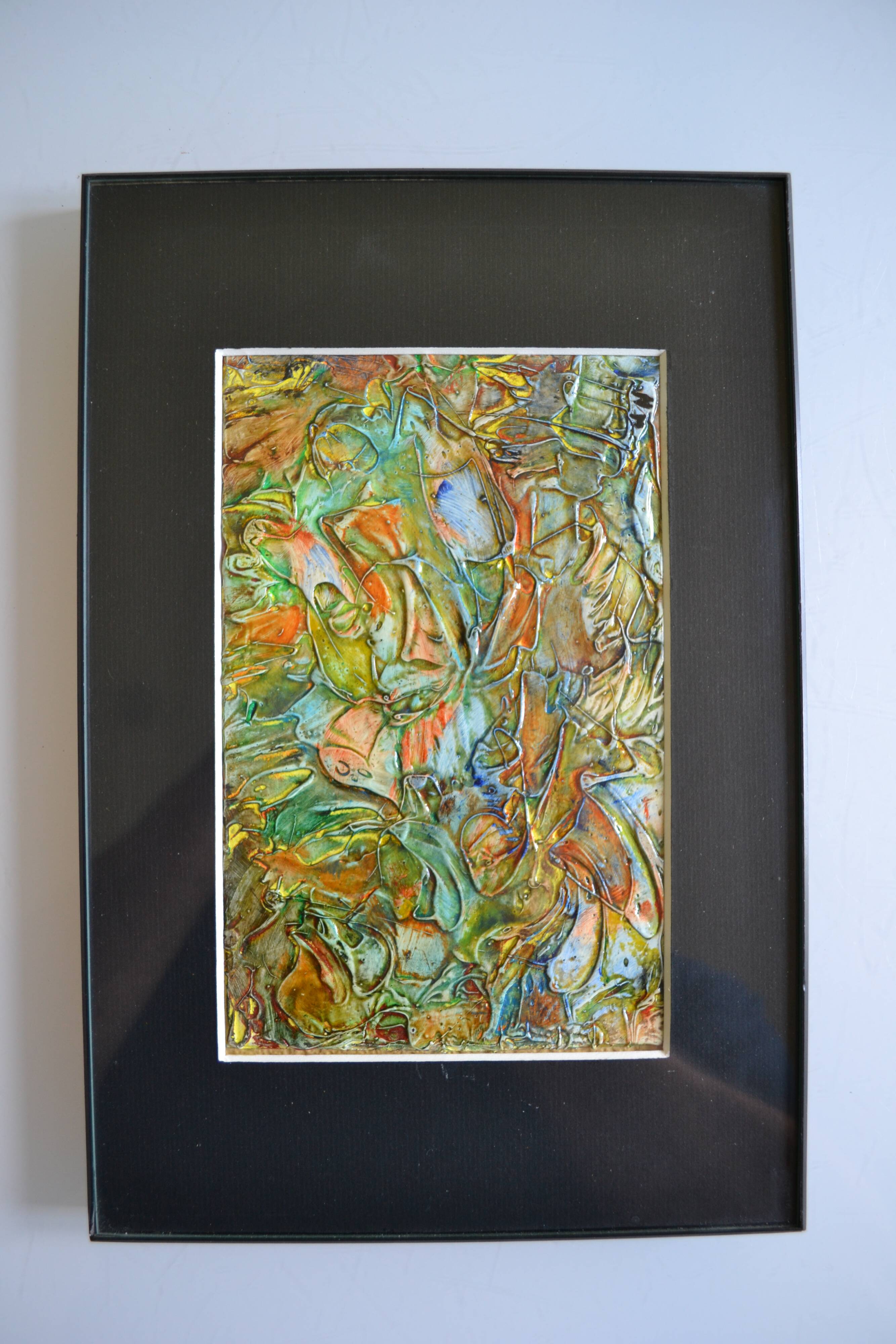 Framed abstract painting under glass