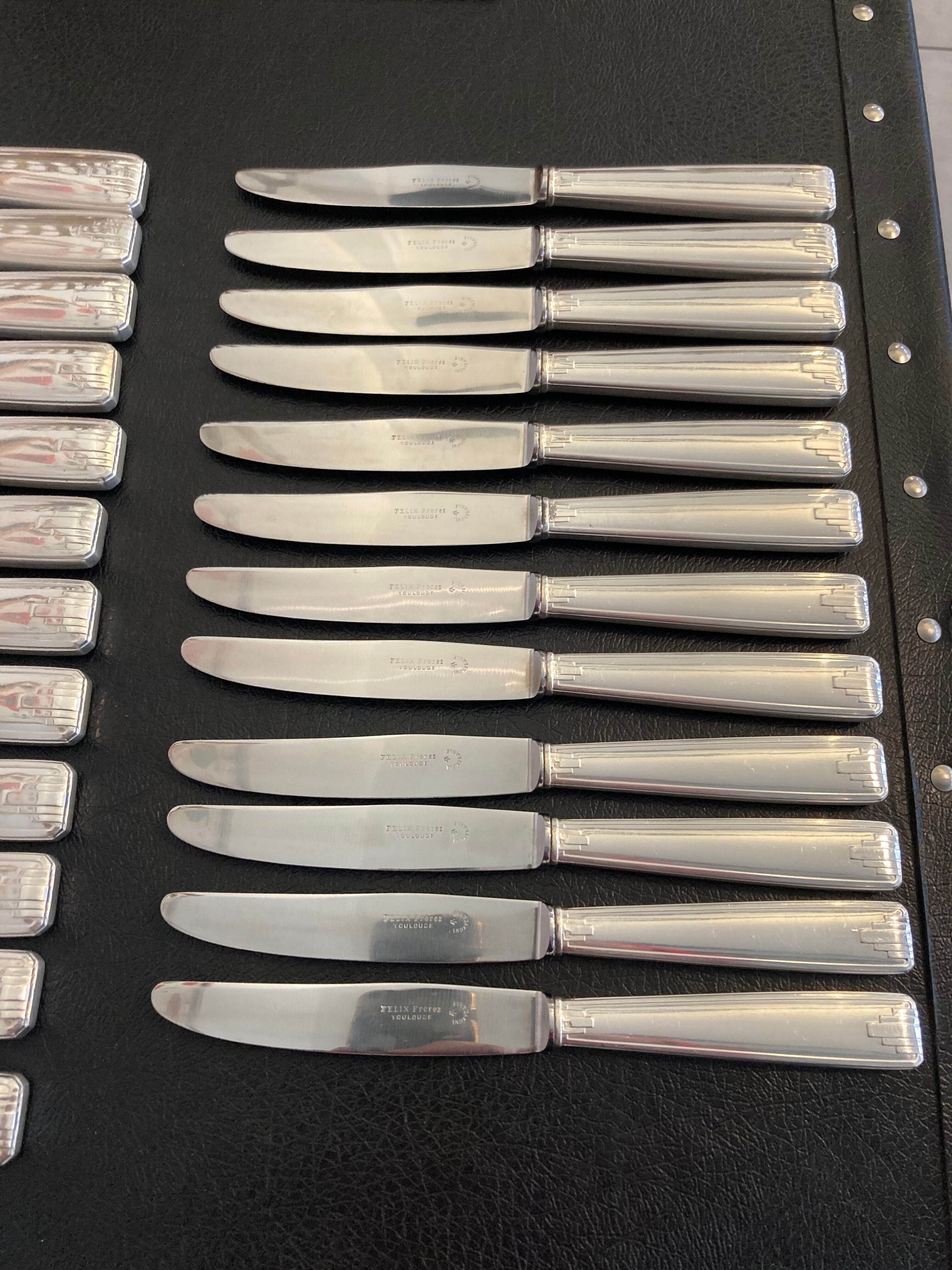 Set of 24 silver metal knives art deco