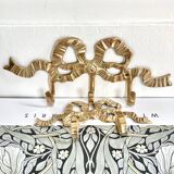 2 hooks in gilded brass